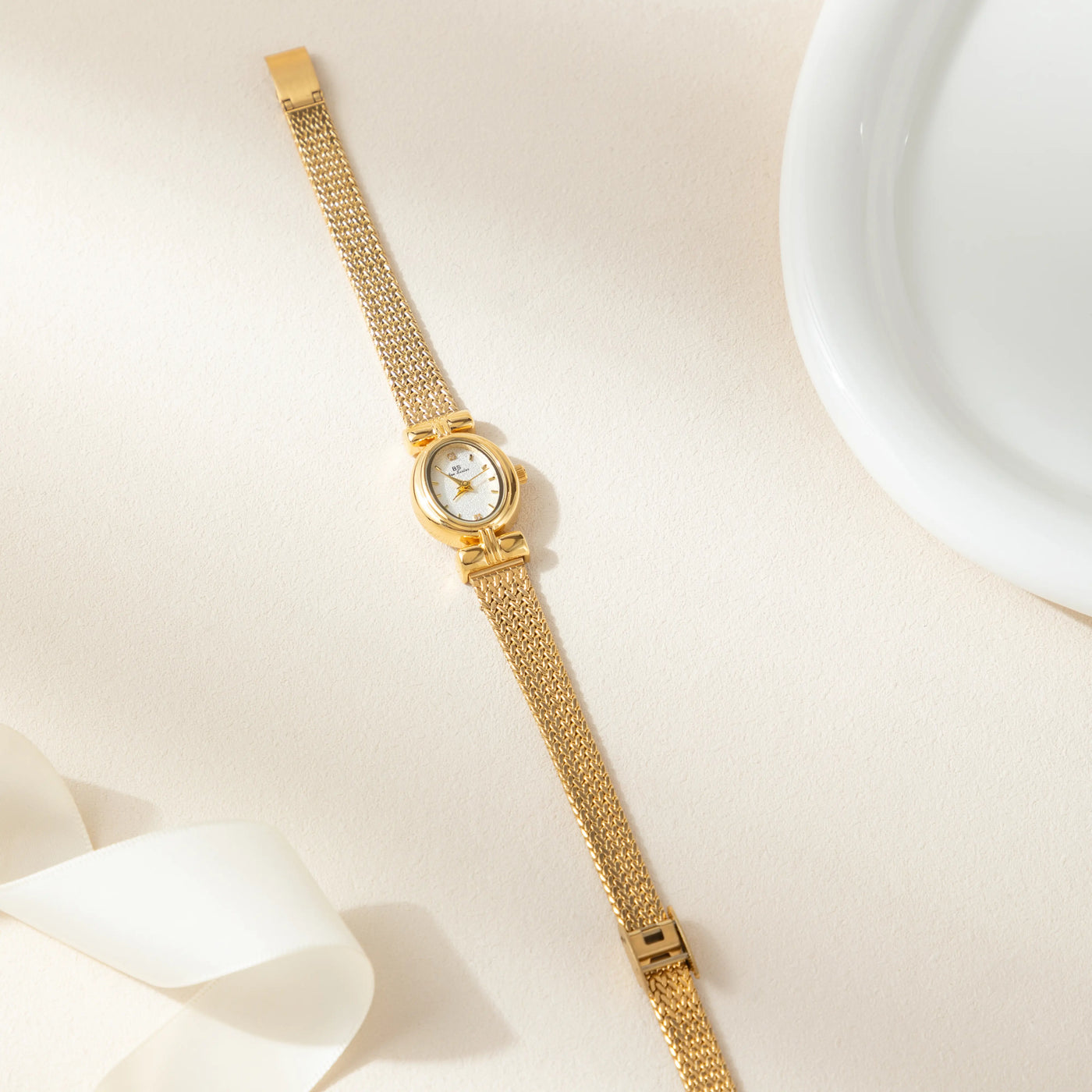 Golden Weave Oval Dial Watch