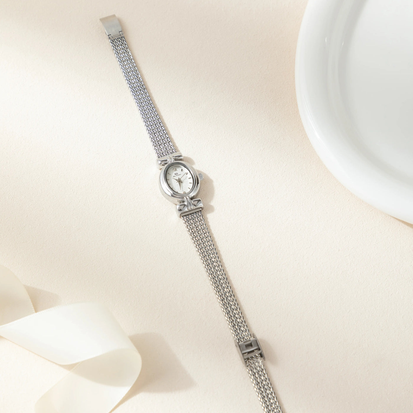 Golden Weave Oval Dial Watch