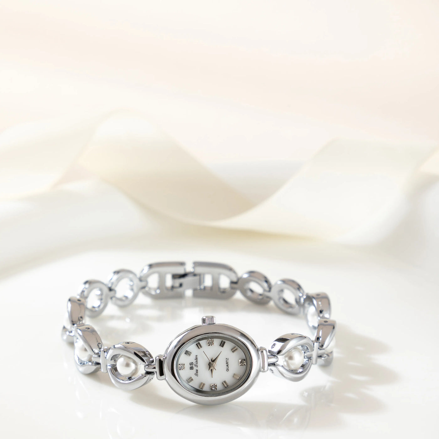 Aurora Oval Gold Timepiece