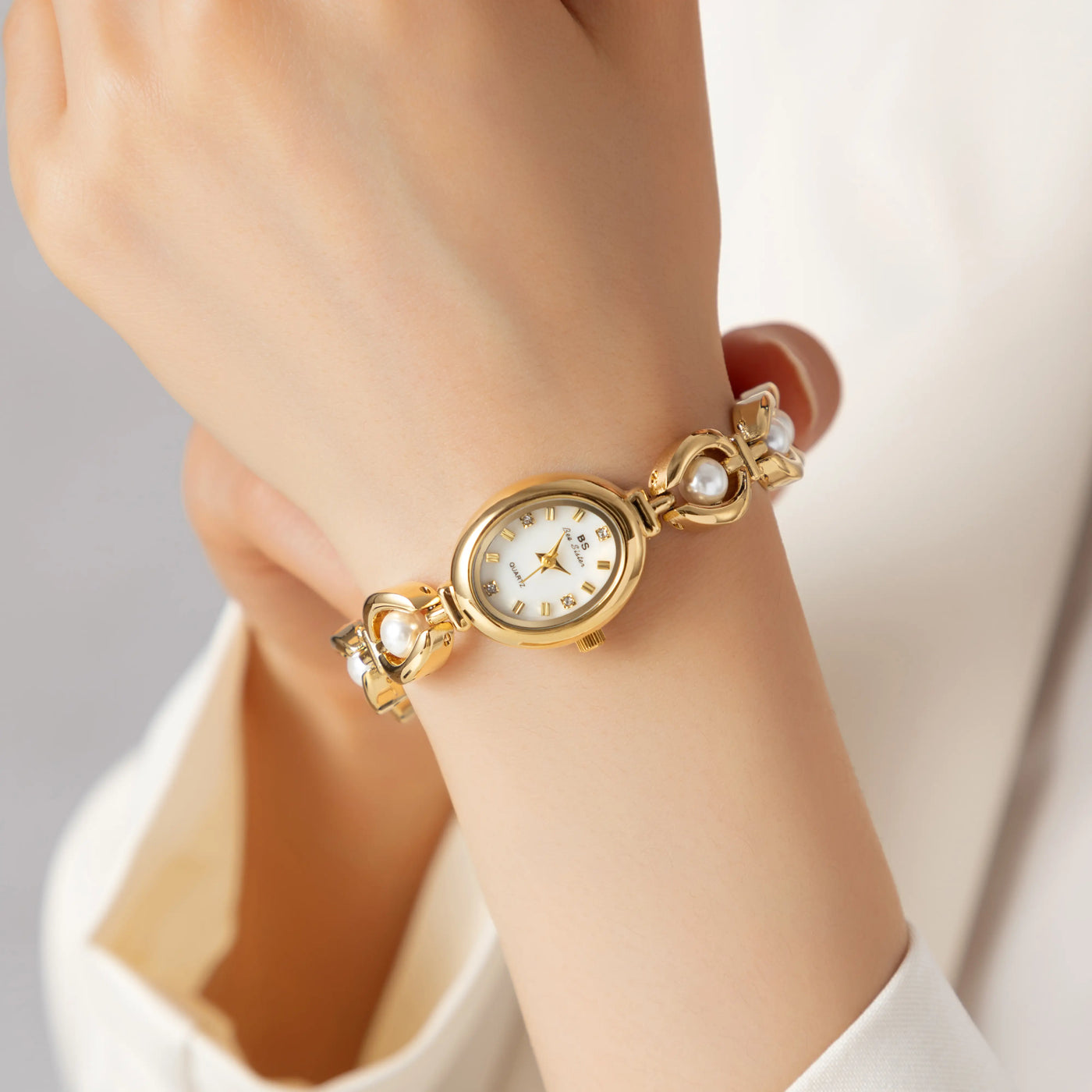 Aurora Oval Gold Timepiece