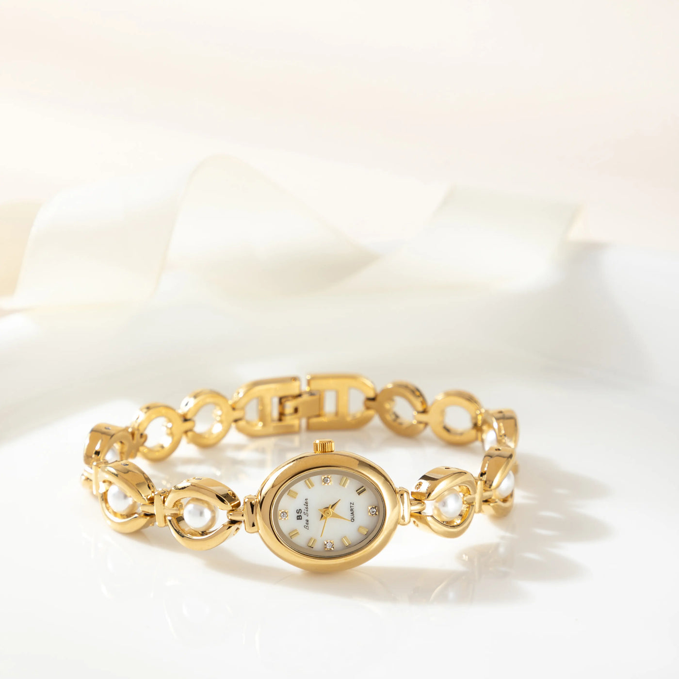 Aurora Oval Gold Timepiece