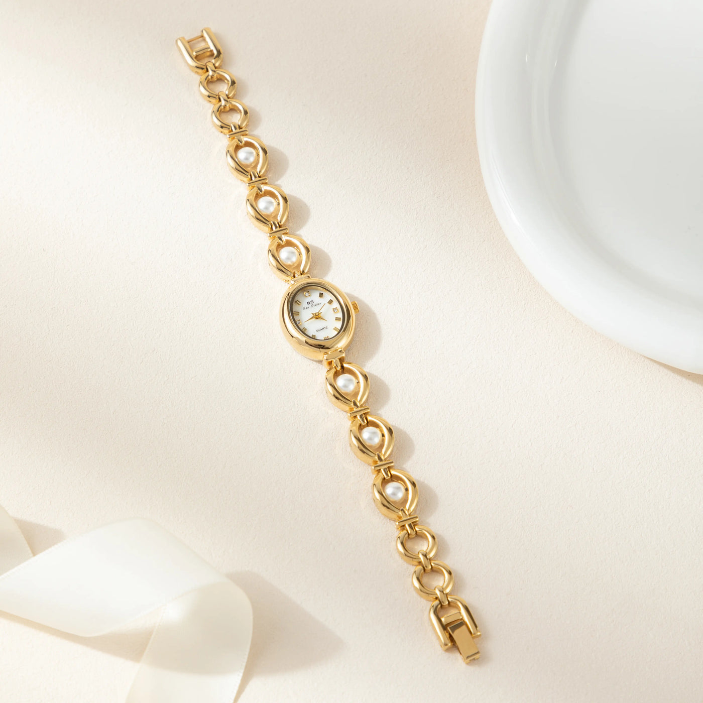 Aurora Oval Gold Timepiece