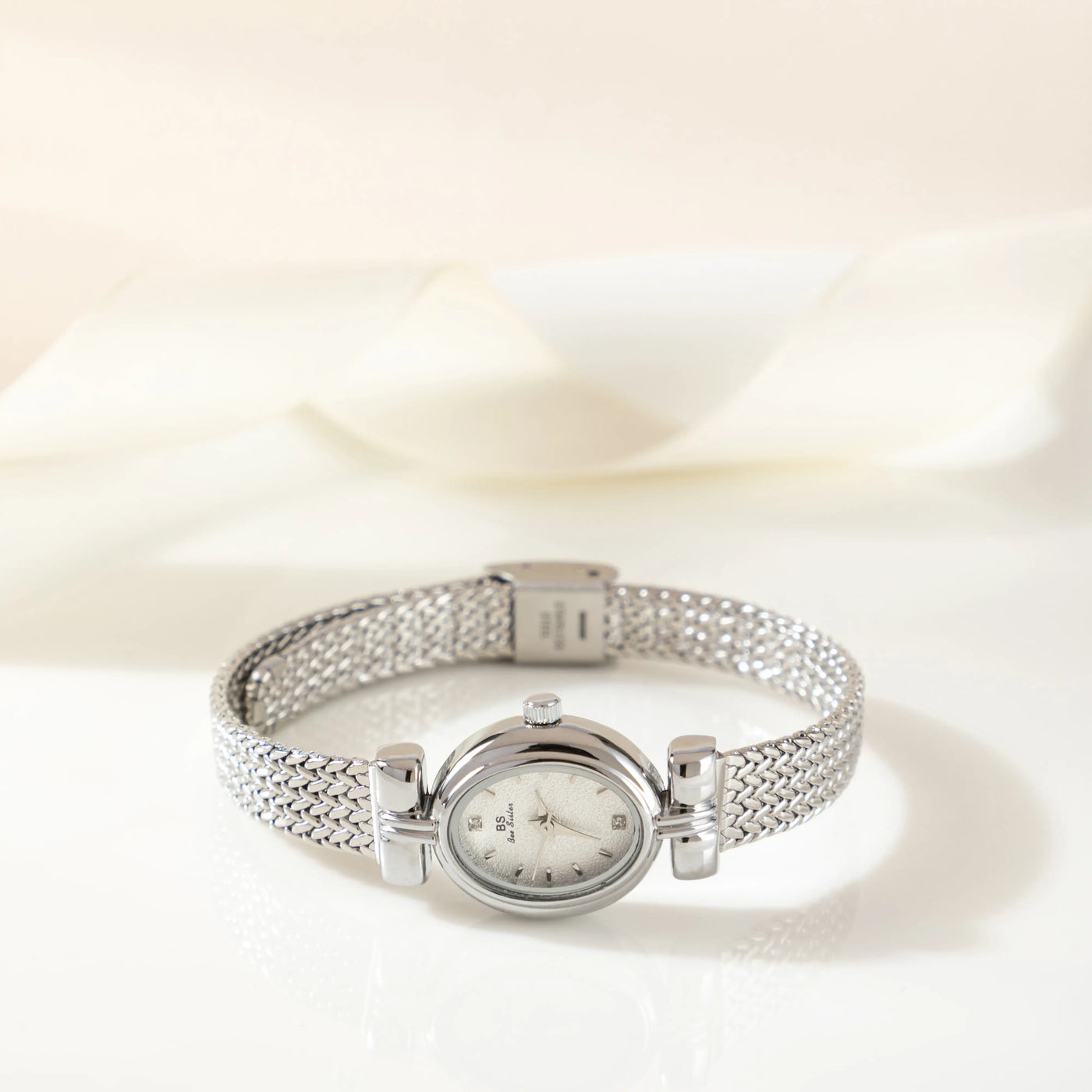 Golden Weave Oval Dial Watch