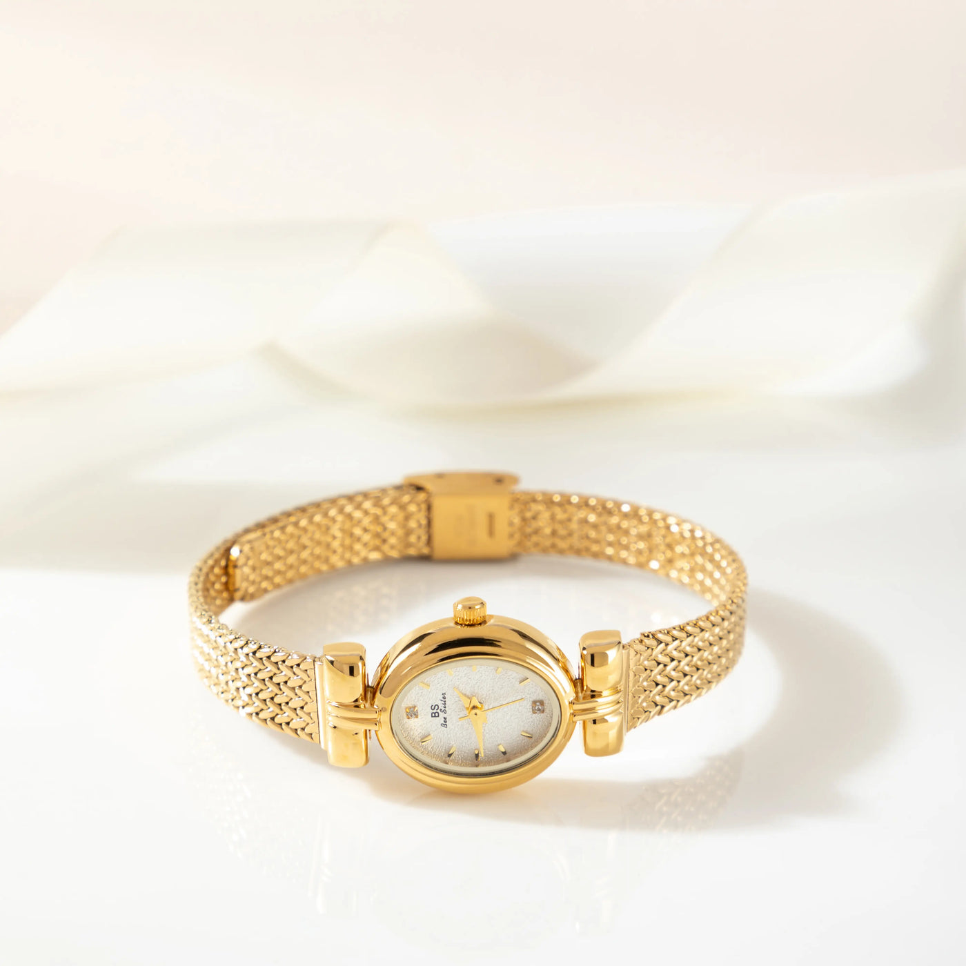 Golden Weave Oval Dial Watch